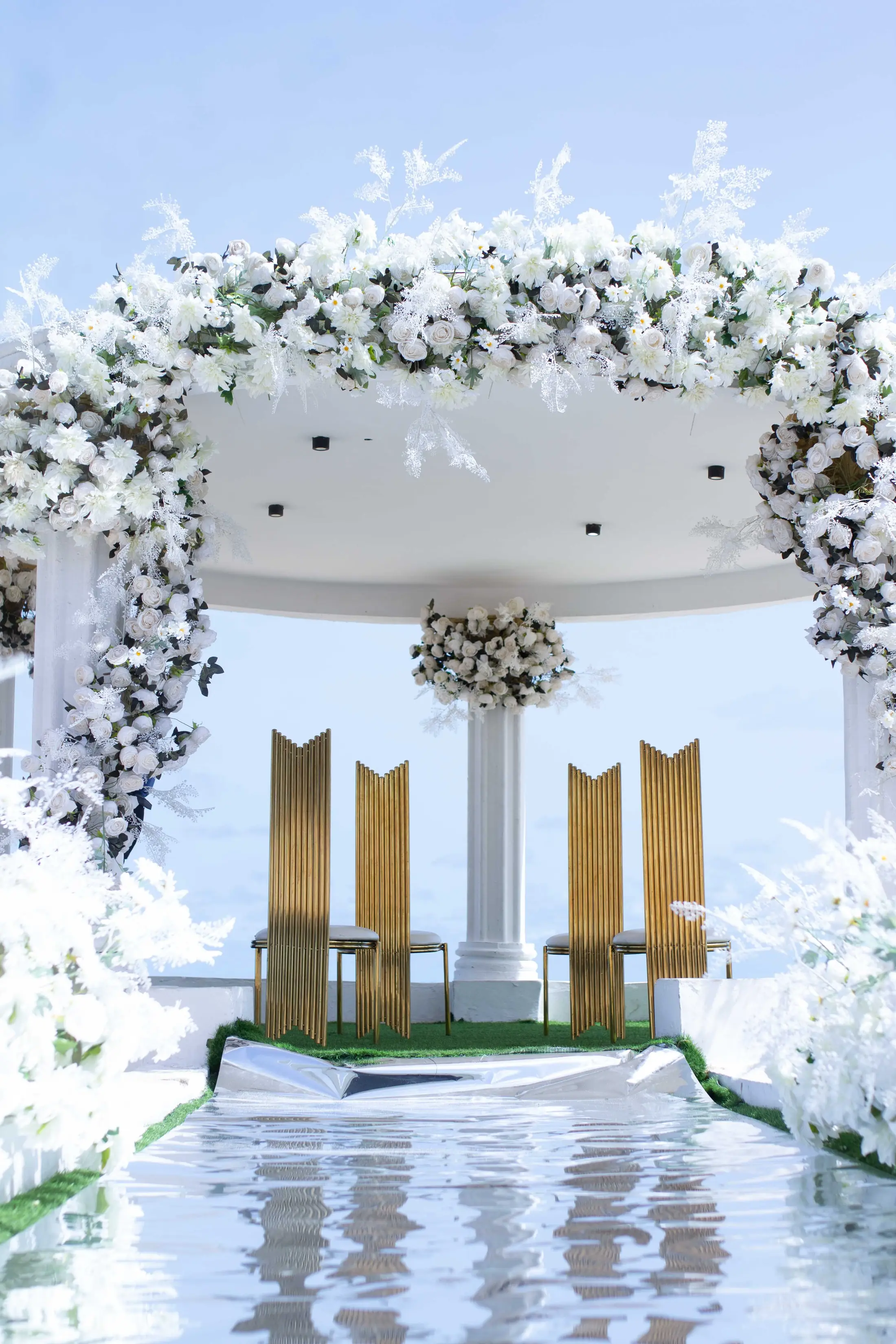 The gazebo's white flower canopy up close