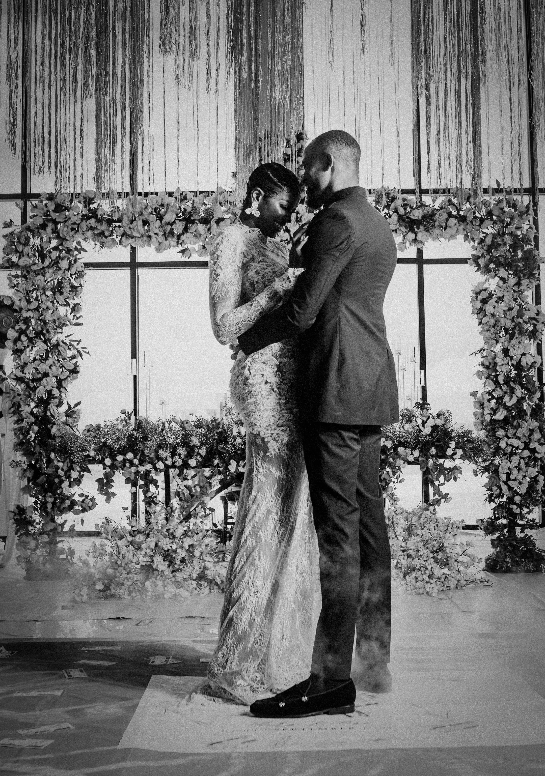 Black and white portrait of a couple embracing