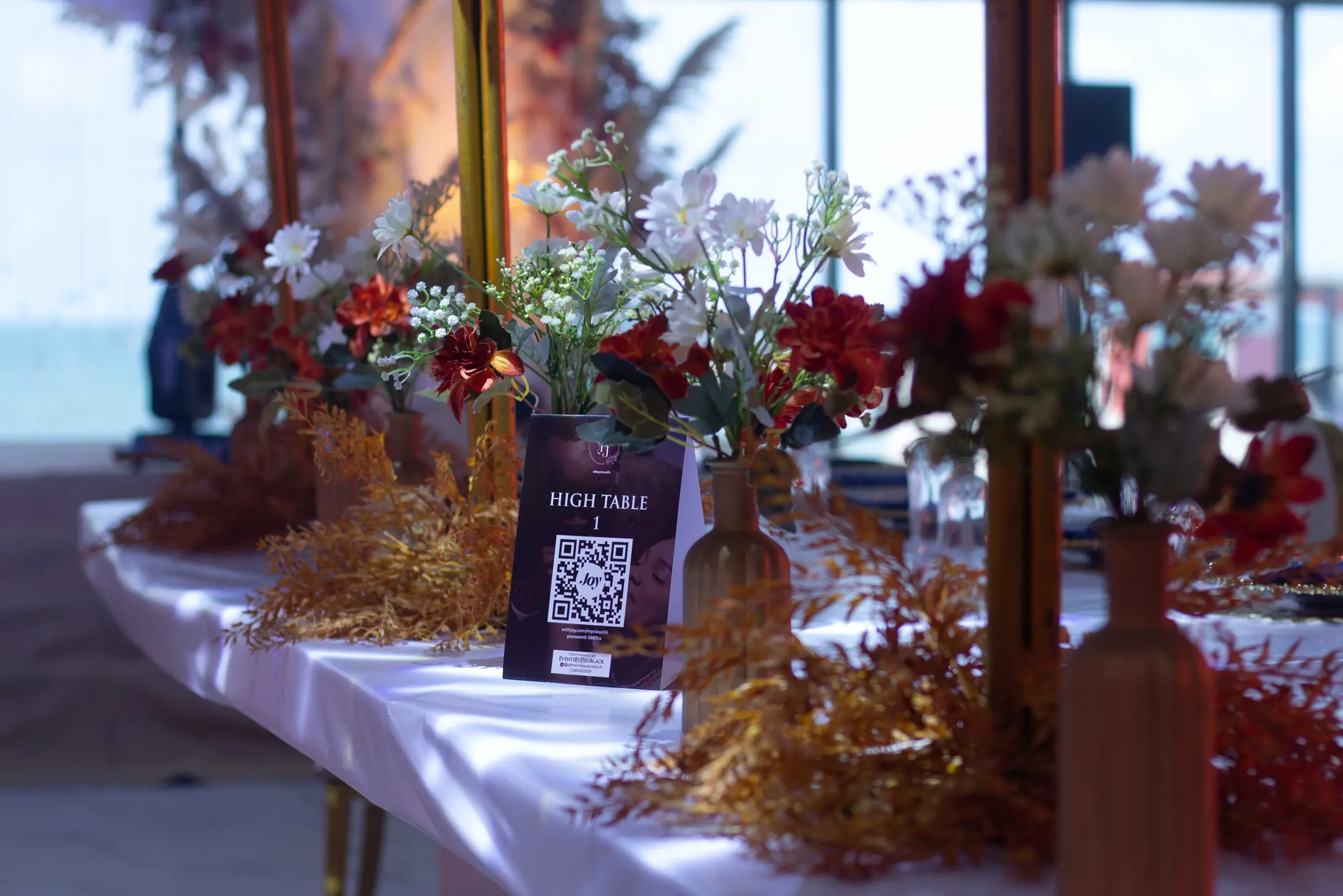 Flower centrepieces on a dressed table